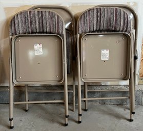 Set Of Four Metal Folding Chairs With Patterned Cushions
