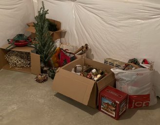 Assortment Of Christmas Items Including Tree, Decor, And More