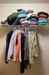 Assortment Of Womens Clothing Including Sweaters, Jackets, Shorts, Shirts, And More