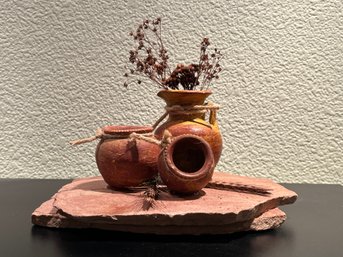 Small Red Clay Pot Decor On Sandstone