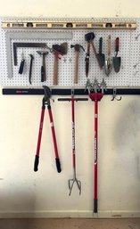 Assortment Of Garage Items Including Small Shovels, Garden Claw, And More