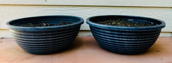 Two Plastic Wide Potters