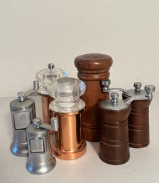 Assorted Salt And Pepper Grinders And Shakers