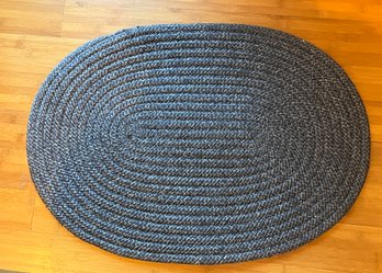 Pair Of Outdoor Braided Charcoal Colored Rugs