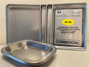 Three 1/4 Sheet Pans, 1/2 Sheet Crisper Tray, And Stainless Trays