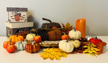 Fall Decor Including Small Pumpkins And Decorative Boxes