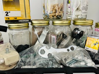 Variety Of Jars Full Of Home Repair Supplies- Nails And Screws