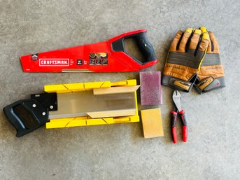 Pair Of Saws, Gloves And Pliers