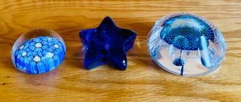 Three Blue Glass Paper Weights