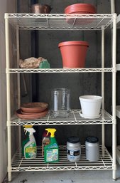 Wire Rack With Outdoor Flower Pots And Chemicals