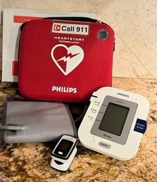 Phillips Defibrillator And Omron Blood Pressure Cuff