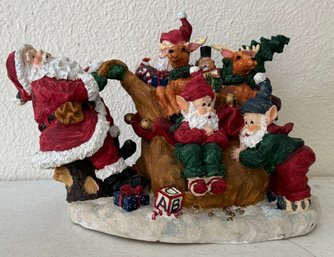 Santa Pulling His Bag Of Toys W/ Elves & Reindeer Figurine