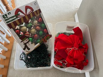 Christmas Ornaments, Bows And Lights With Plastic Bins
