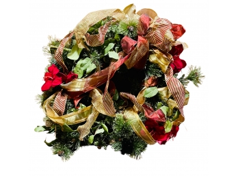 Christmas Wreath With Poinsettia, Pinecones And Ribbon