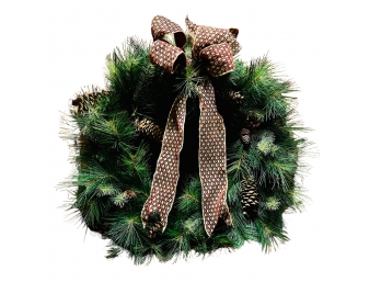 Christmas Wreath With Pinecones And Ribbon
