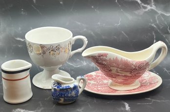 Variety Of Creamers And Serving Ware