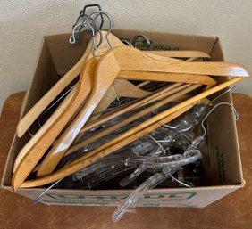 Large Assortment Of Wooden And Plastic Hangers