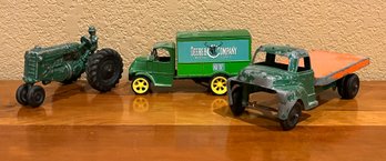 Vintage 1950-1960s Structo Truck, John Deere Coin Bank, And MM Green Rubber Tractor