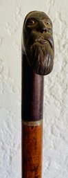 Cane/ Walking Stick With Carved Face Handle