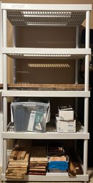 Plastic Storage Shelf With Variety Of Miscellaneous Wood And Household Items