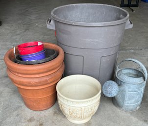 Metal Watering Can, Bucket Full Of Rocks And Flower Pots
