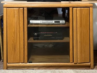 Wood Tv Stand With Glass Display. Incudes VHS And DVD Player