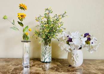Trio Of Faux Flowers In Vases