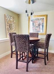 Round Wooden Table With Animal Print Wooden Chairs