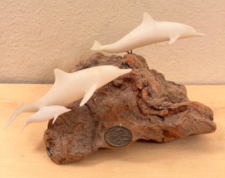 Sculpture Of Dolphins With Knurled Wood Base