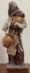 Elderly Lady With Pots Folk Art Figurine