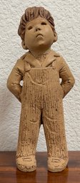 Boy In Overalls Figurine