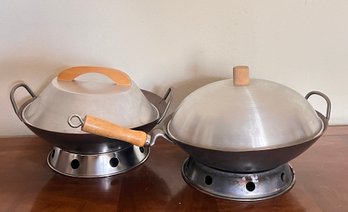 Two Large Carbon Steel Woks With Lids And Burner Stands