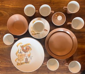 Dinnerware Set Of Cups, Plates, And Bowls Featuring Brown And White Rooster Pattern