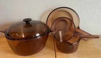 Pyrex Visions Cookware, Two (2) Skillets, One (1) Sauce Pan With Pour Spout, And One (1) Dutch Oven