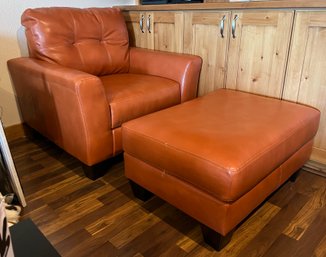 Orange Bonded Leather Chair And Ottoman