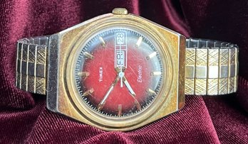 Vintage 1960s Timex Maroon Dial Day Date Electric Watch