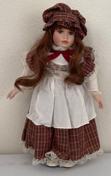 Vintage Porcelain Doll In Plaid Dress
