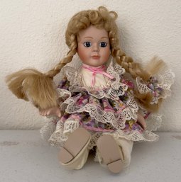 Vintage Porcelain Doll In Pink Dress