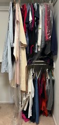 Assortment Of Womens Clothes Including Shirts And Dresses