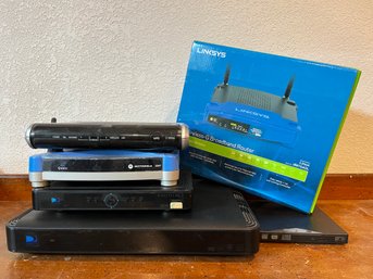 Lynksys Router & Directv And Qwest Boxes