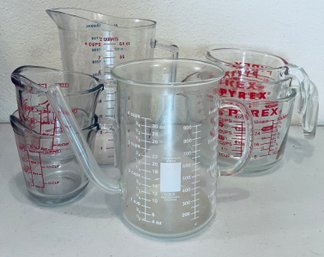 Variety Of Graduated Liquid Measuring Cups Including Anchor Hocking, Pyrex, And More