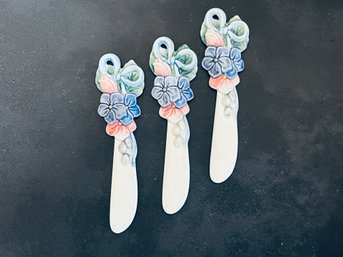 Three Floral Porcelain Butter Knives