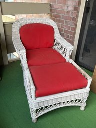 Pair Of White Wicker Outdoor Chairs With Red Cushions And One Ottoman