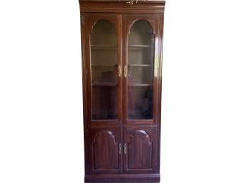 A Handsome Glass Fronted Curio Cabinet In Dark Wood Finish