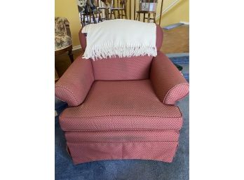An Upholstered Stuffed Roll Arm Swivel Chair With 100 Cotton Ralph Lauren Throw Blanket