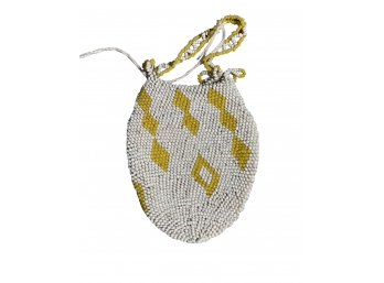 A Tiny Beaded Sioux Hand Beaded Bag With Leather Lining