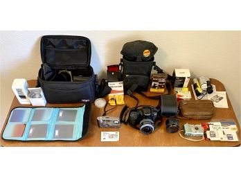 Collection Of Cameras And Accessories