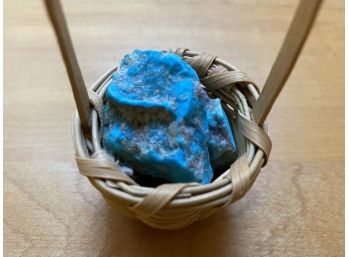 Two Pieces Of Natural Turquoise In Small Woven Basket