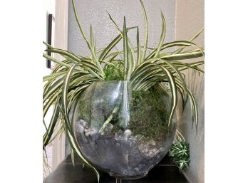 Fake Plant In Large Glass Vase
