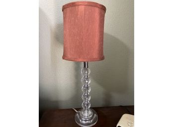 A Glass Table Lamp With Silk Shade And Faceted Ball Design